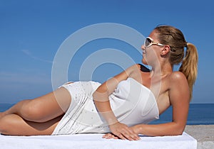 Portrait of girl in white short dress