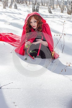 Portrait of the girl who found a red rose