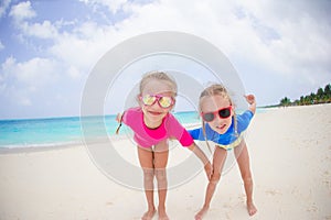 Portrait of girls having fun at tropical beach
