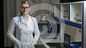 Portrait of glad female doctor smiling at hospital