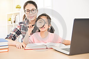 Portrait of glasses woman teacher and young girl