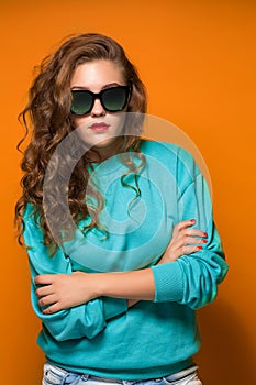 Portrait gloomy young brunette woman with wavy hair