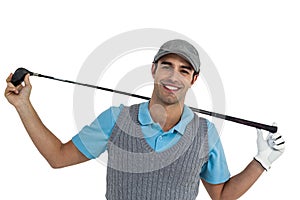 Portrait of golf player holding a golf club