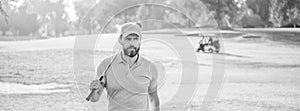 portrait of golfer in cap with golf club. people lifestyle. serious man after game