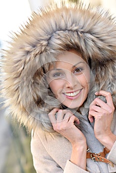Portrait of good-looking woman in winter coat