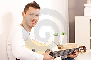 Portrait of goodlooking guitarist