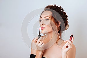 Portrait of a gorgeous young brunette woman in stylish makeup.