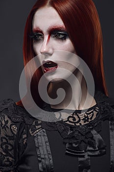 Portrait of gothic girl with black eyes