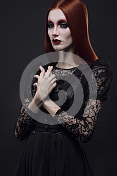Portrait of gothic girl with black eyes
