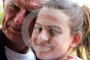 A portrait of a granddaughter and grandfather