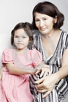 Portrait of a grandmother with her granddaughter