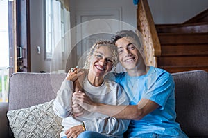 Portrait of grateful teenager man hug smiling middle-aged mother show love and care, thankful happy grown-up son in embrace