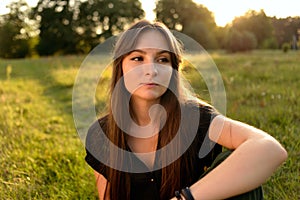 Portrait on green backdrop. Female fashion. Spring meadow. Fashion woman. Rural nature. Summer season. Sunny yellow