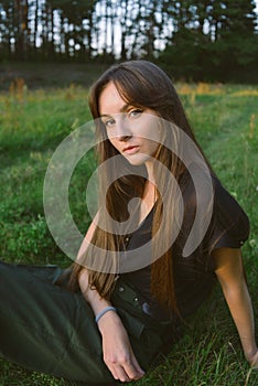 Portrait on green backdrop. Female fashion. Spring meadow. Fashion woman. Rural nature. Summer season. Sunny yellow