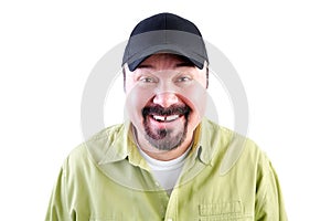 Portrait of grinning man in baseball cap