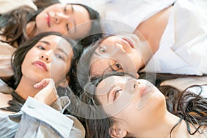 Portrait group of beautiful fashion women meetin in bedroom