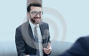 Portrait of a group of business men working together at a meetin