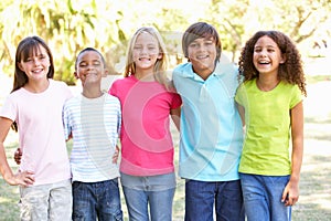 Portrait Of Group Of Children Playing In Park