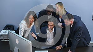 Portrait of a group of multiracial business people working together at a meeting