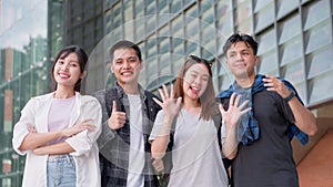 Portrait group of University students smiling standing at College. Happy young people smiling together looking at camera, Friends