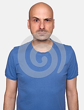 Portrait of a grumpy man isolated