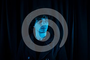 Portrait guy melancholic dark background