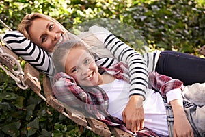 Portrait, hammock and relax happy kid, mom and family bond, care or spending quality time together. Wellness, support