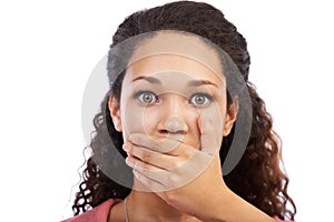 Portrait, hand on mouth and omg with a surprised black woman in studio on a white background in shock. Face, wow and