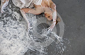 Portrait, hands and torso of a woman in gray, white, color, painted, dancing on the floor, elegantly decorative, in color.
