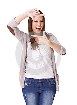 Portrait, hands and woman with selfie frame in studio for photography, gesture or sign on white background. Finger