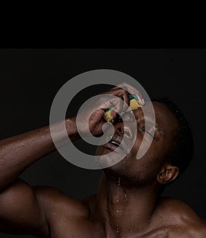 African American Man Washing Face