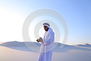 Portrait of handsome Arab businessman who experiencing new iWatc