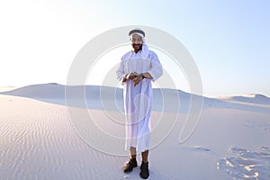 Portrait of handsome Arab businessman who experiencing new iWatc