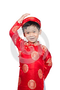 Portrait of a handsome Asian baby boy on traditional festival co