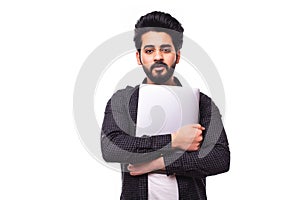 Portrait of handsome bearded arabic man with laptop isolated on white background