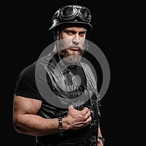 Portrait Handsome Bearded Biker Man in Leather Jacket and Helmet