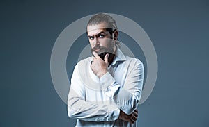 Portrait of handsome bearded man in White shirt. Male beard and mustache. Sexy male, brutal macho, hipster. Elegant