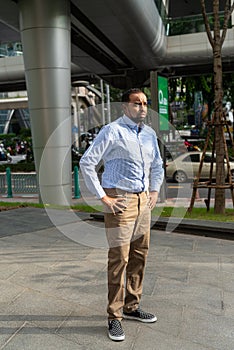 Portrait of handsome black man in city ready for business