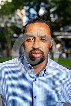 Portrait of handsome black man in city ready for business