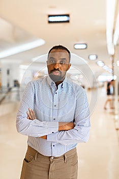 Portrait of handsome black man in city ready for business