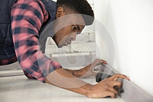 portrait handsome black man with hands on chin