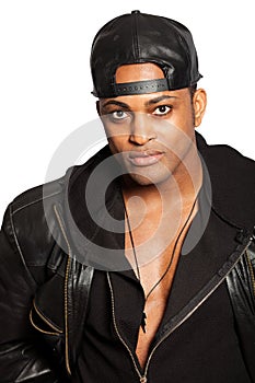 Portrait of a handsome black man with hat. Blacks clothes. PNG available