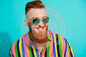 Portrait of handsome cheerful boyfriend in hipster shirt toothy smiling wear sunglasses rayban brand isolated on cyan