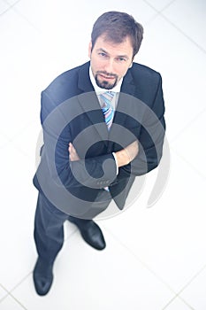 Portrait of a handsome elderly business man standing isolated on