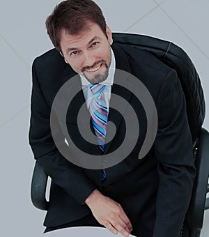 Portrait of a handsome elderly business man standing isolated on