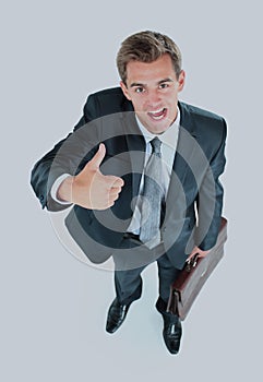 Portrait of a handsome elderly business man standing isolated on white background.