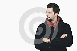 Portrait handsome elegant man crossed his arms looking away isolated on white