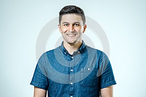 Portrait of handsome guy smiling at camera