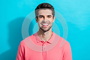 Portrait of handsome guy wearing pink trendy t shirt toothy hollywood smile like photo model isolated on aquamarine
