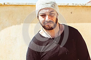 Portrait of a handsome Italy man face outdoors